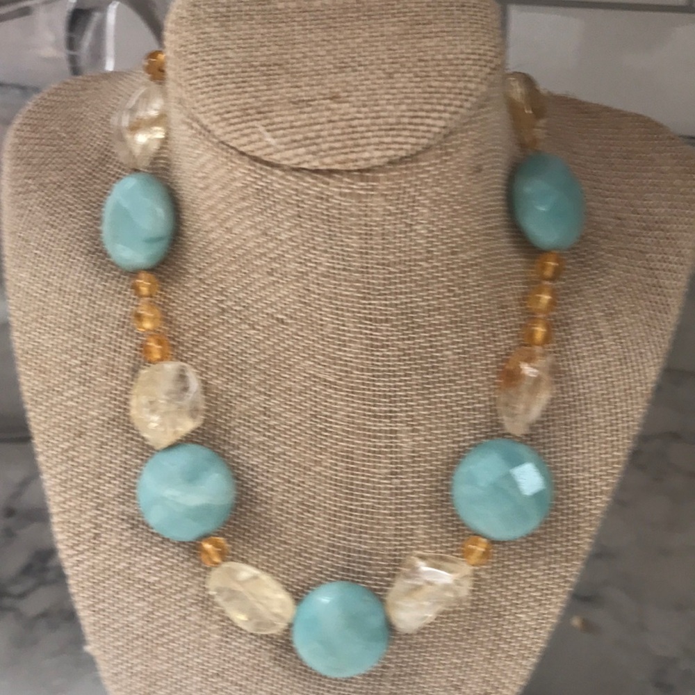 Faceted cut Amazonite surrounded by rough cut citrine and round citrine beads
